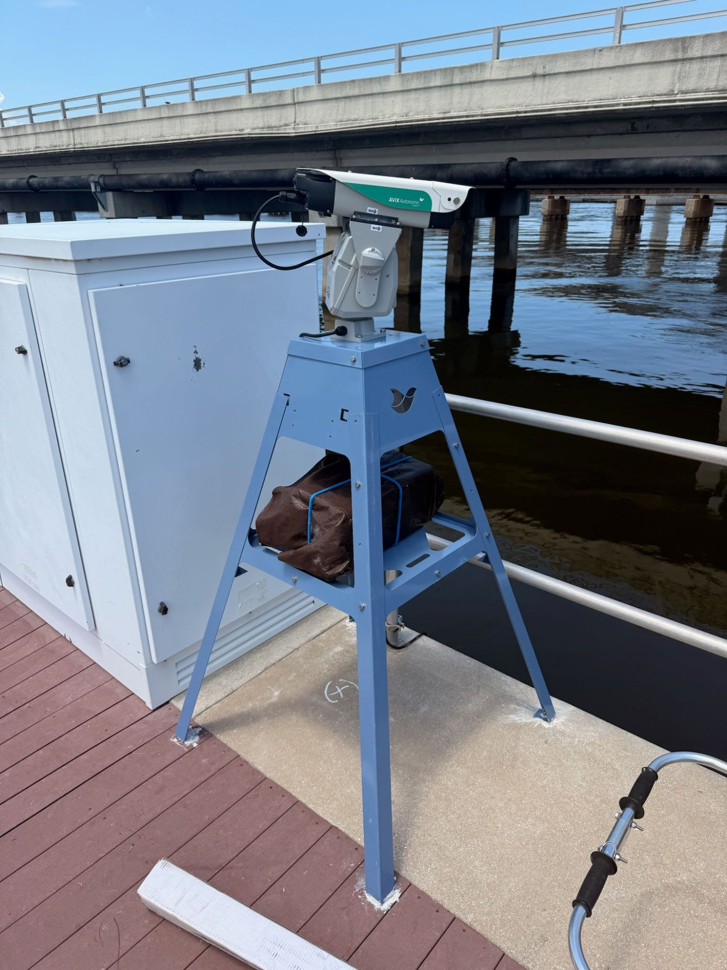 AVIX Autonomic laser bird deterrent unit mounted on a marina dock